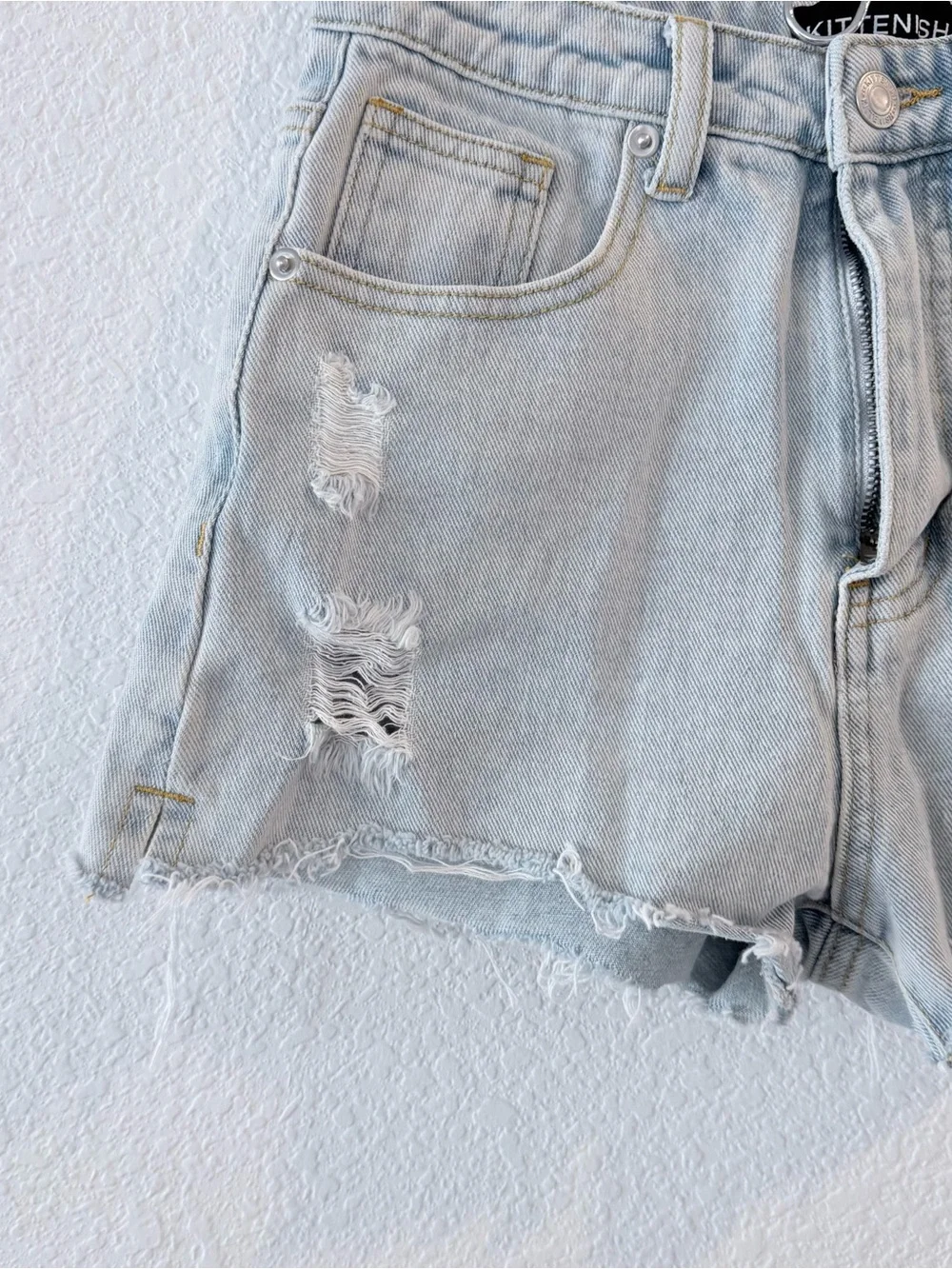 Kittenish- High Rise Light Wash Distressed Shorts - Size 24